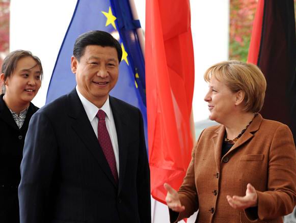 习近平(左)与默克尔(右) 习近平(左)与默克尔(右)